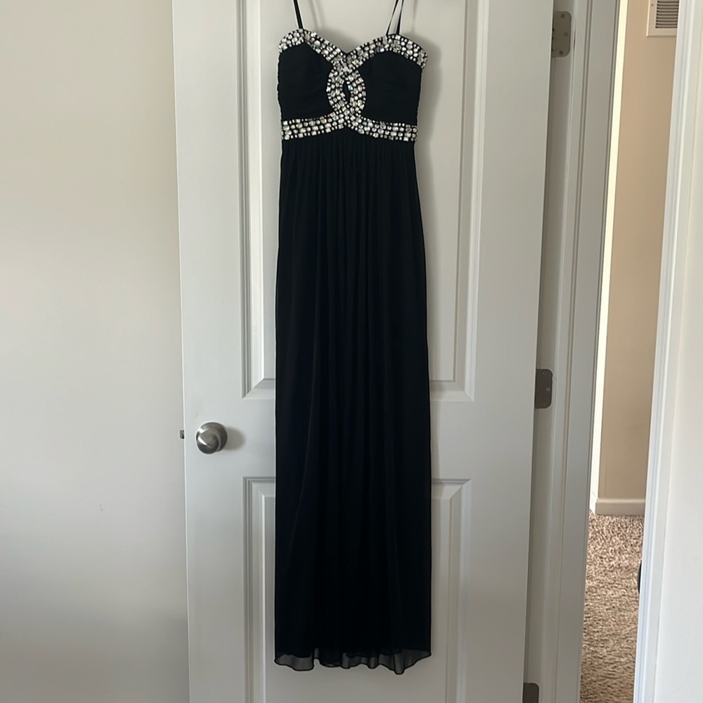 Strapless floor length black dress with gem detail